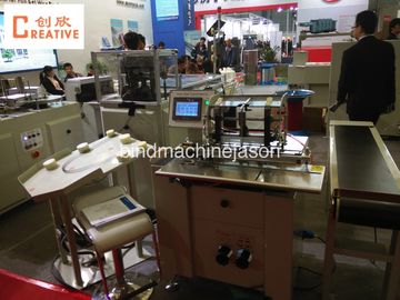 La máquina obligatoria gemela DCA520 de alambre del lazo del calendario y del cuaderno con la suspensión pieza proveedor